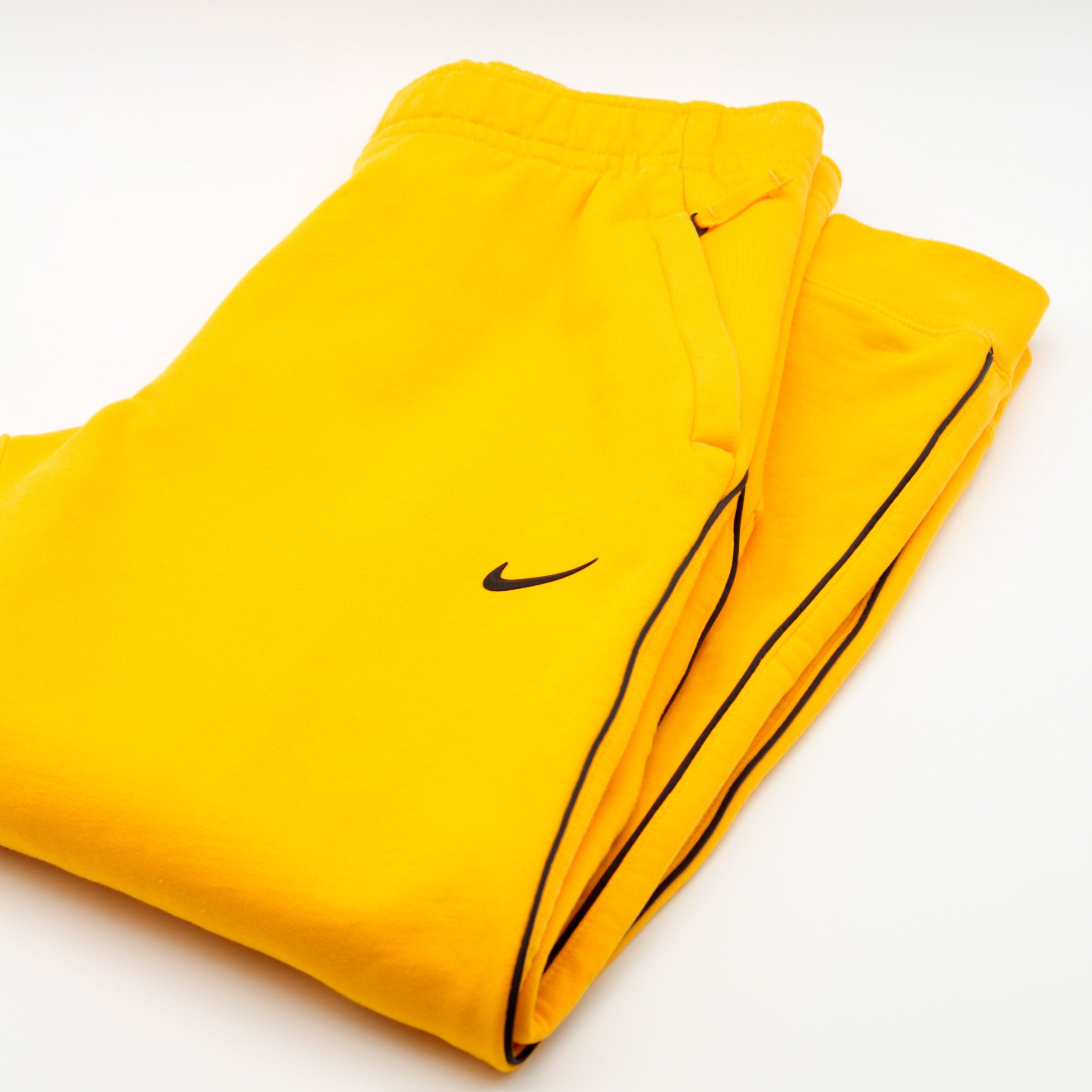 SECONDHAND - NIKE NOCTA TECH PANTS YELLOW